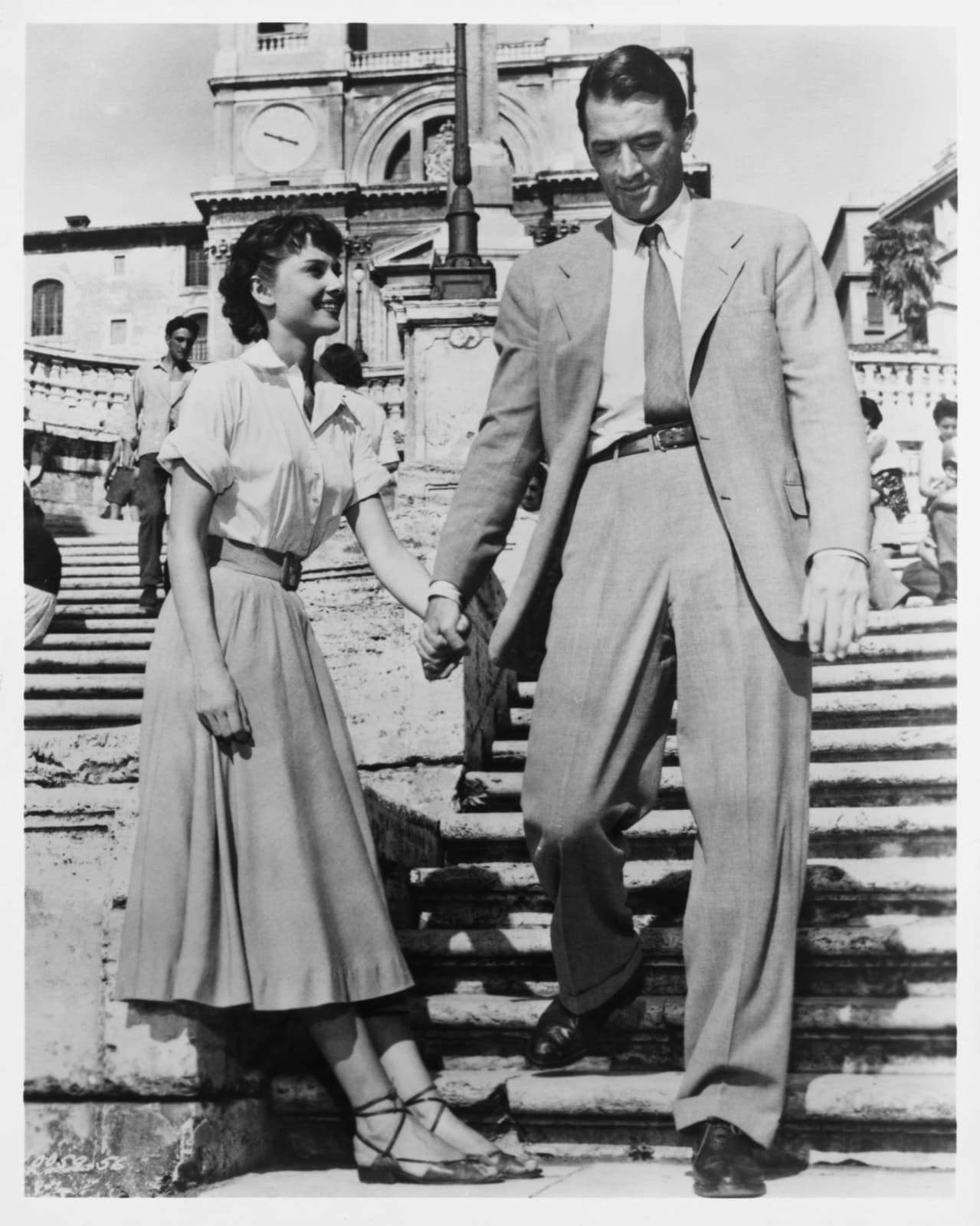 Audrey Hepburn and Gregory Peck on the Spanish Steps in a 1953 publicity photograph